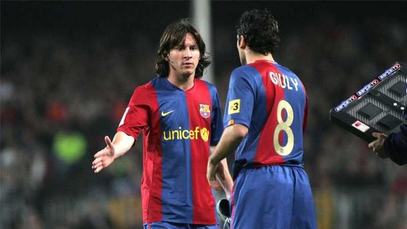 Lionel Messi and Ludovic Guily